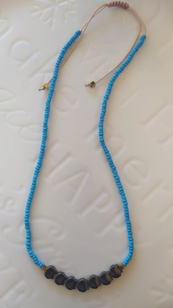 Light blue necklace-hem